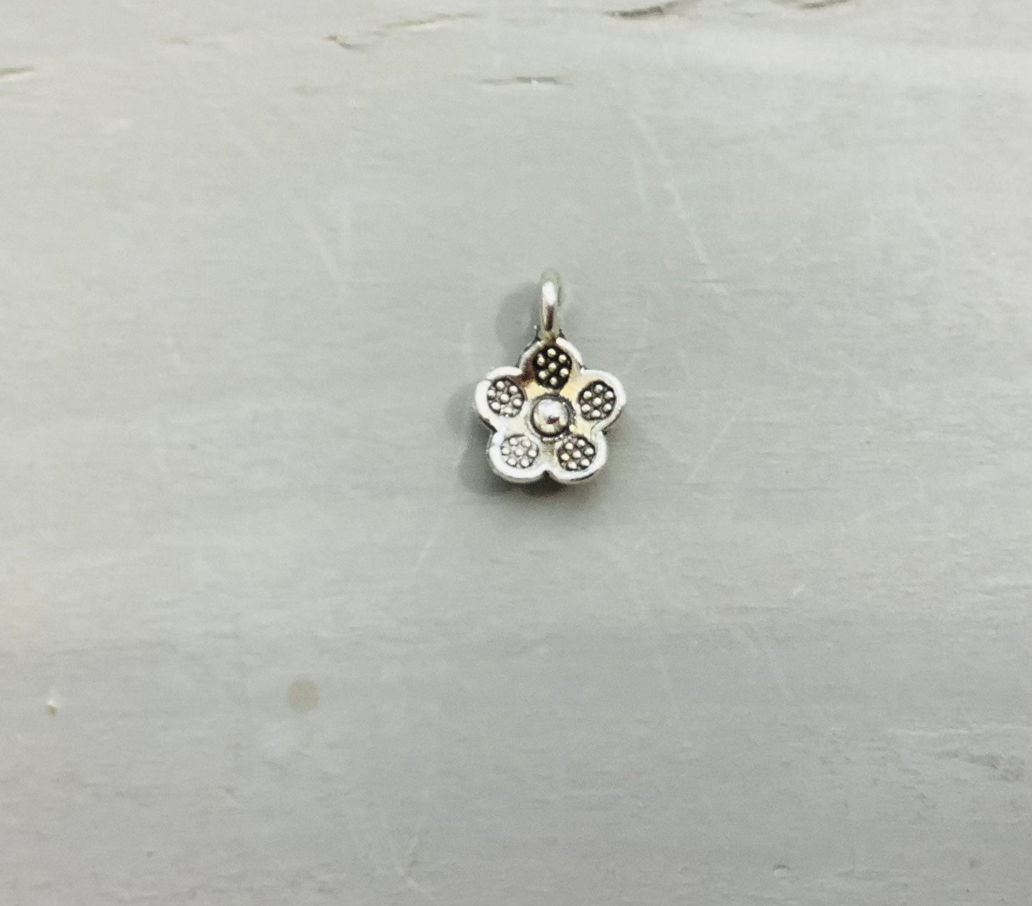 Colorful boho crocheted wrap, with bright turquoise, hot pink, orange gold..