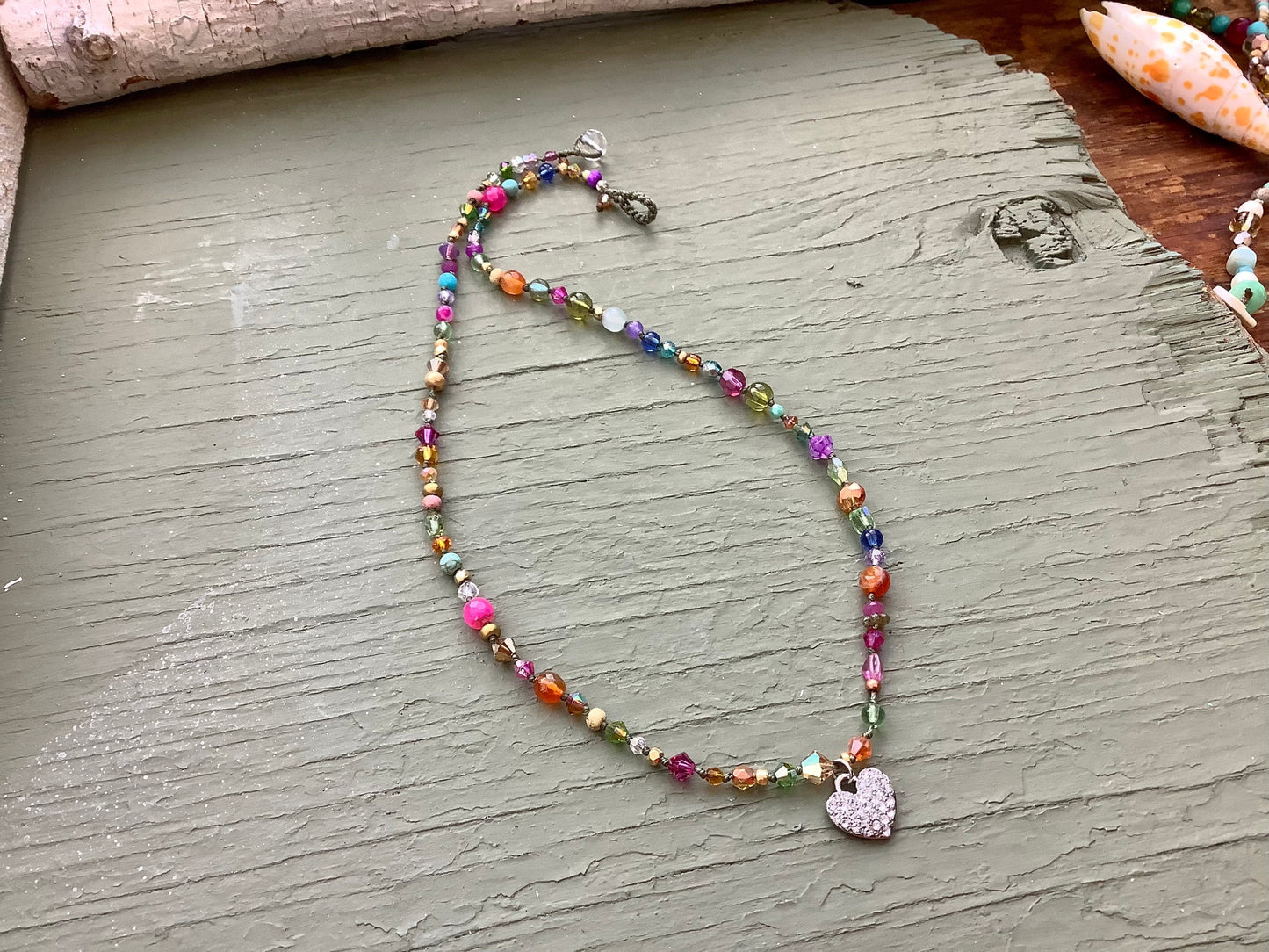 Hand-knotted crystal and gemstone necklace with rhinestone heart