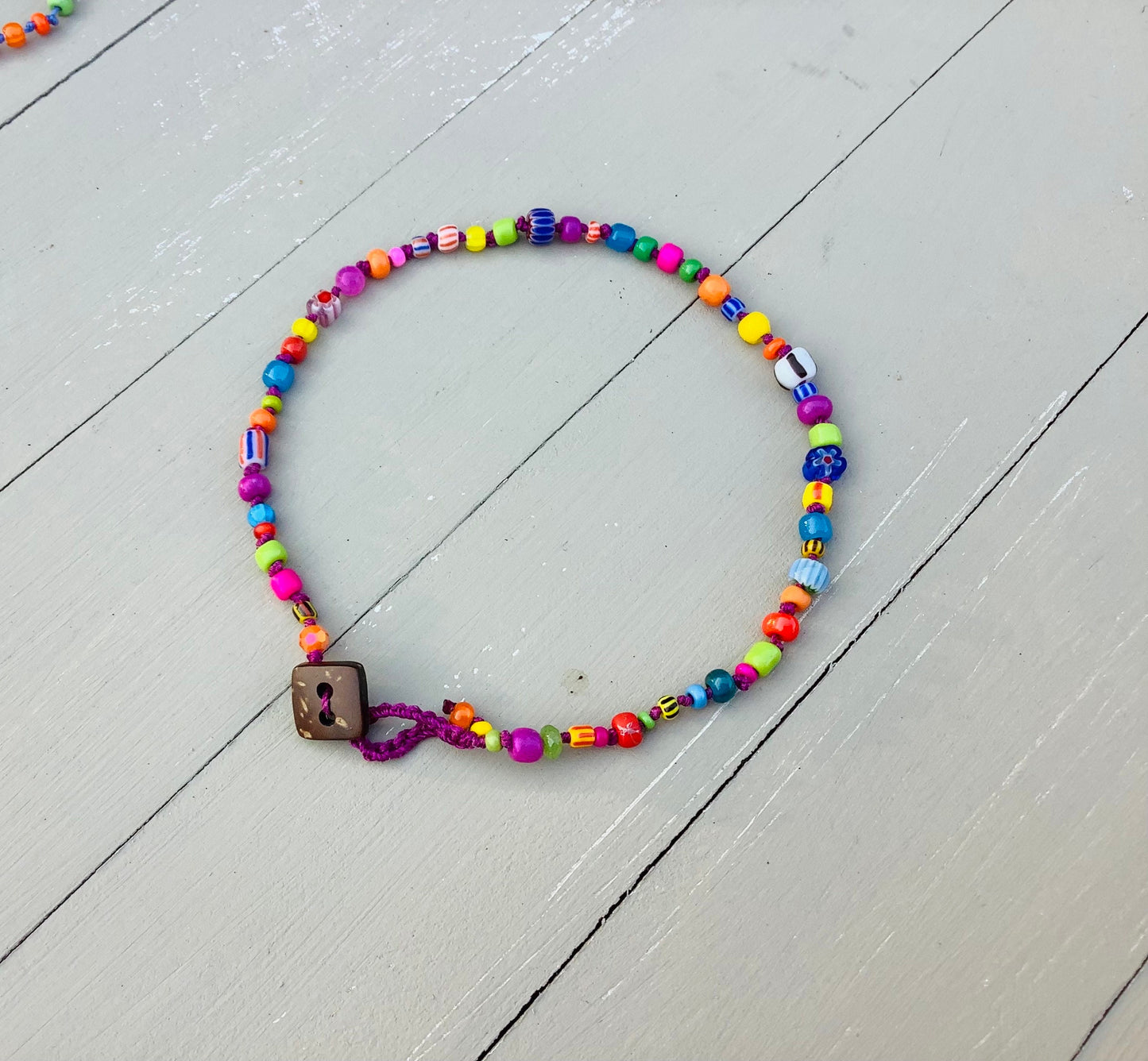 Venetian beaded knotted anklets with coconut button