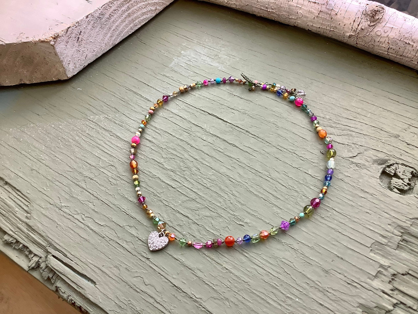 Hand-knotted crystal and gemstone necklace with rhinestone heart