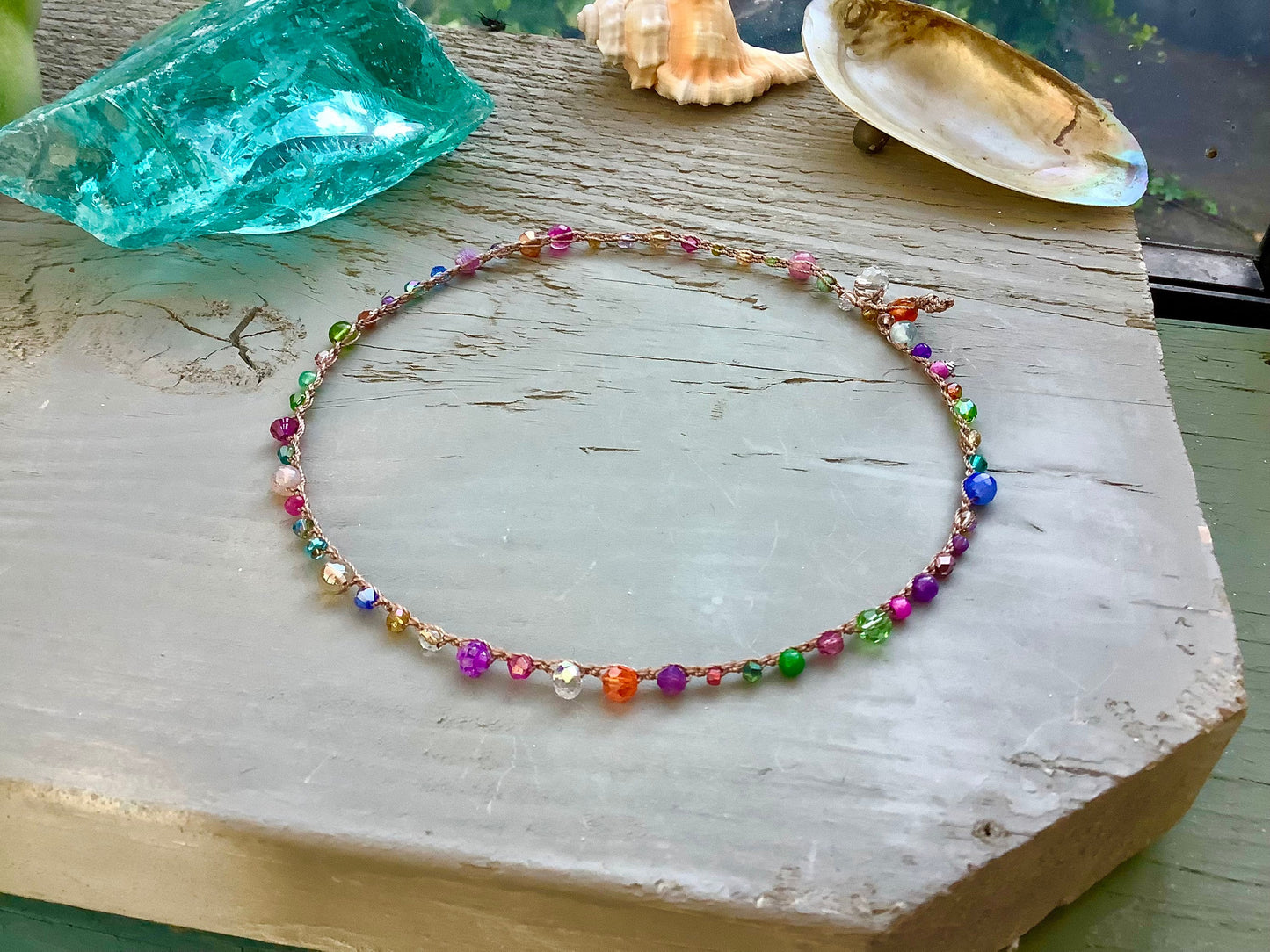 Pebble beach natural earthy necklace, with leaf charm