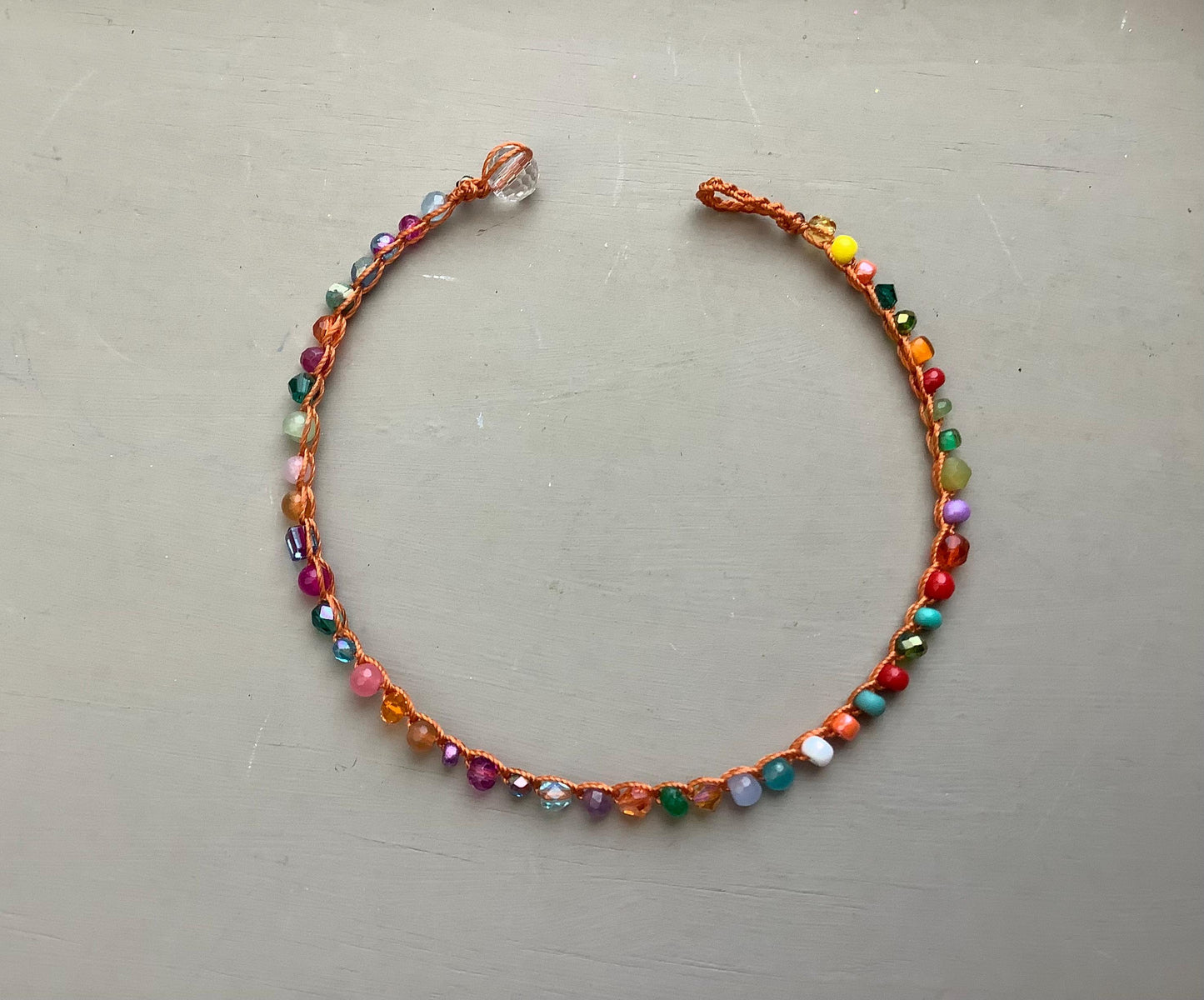 Sunkissed crocheted anklets with gemstones, beachy