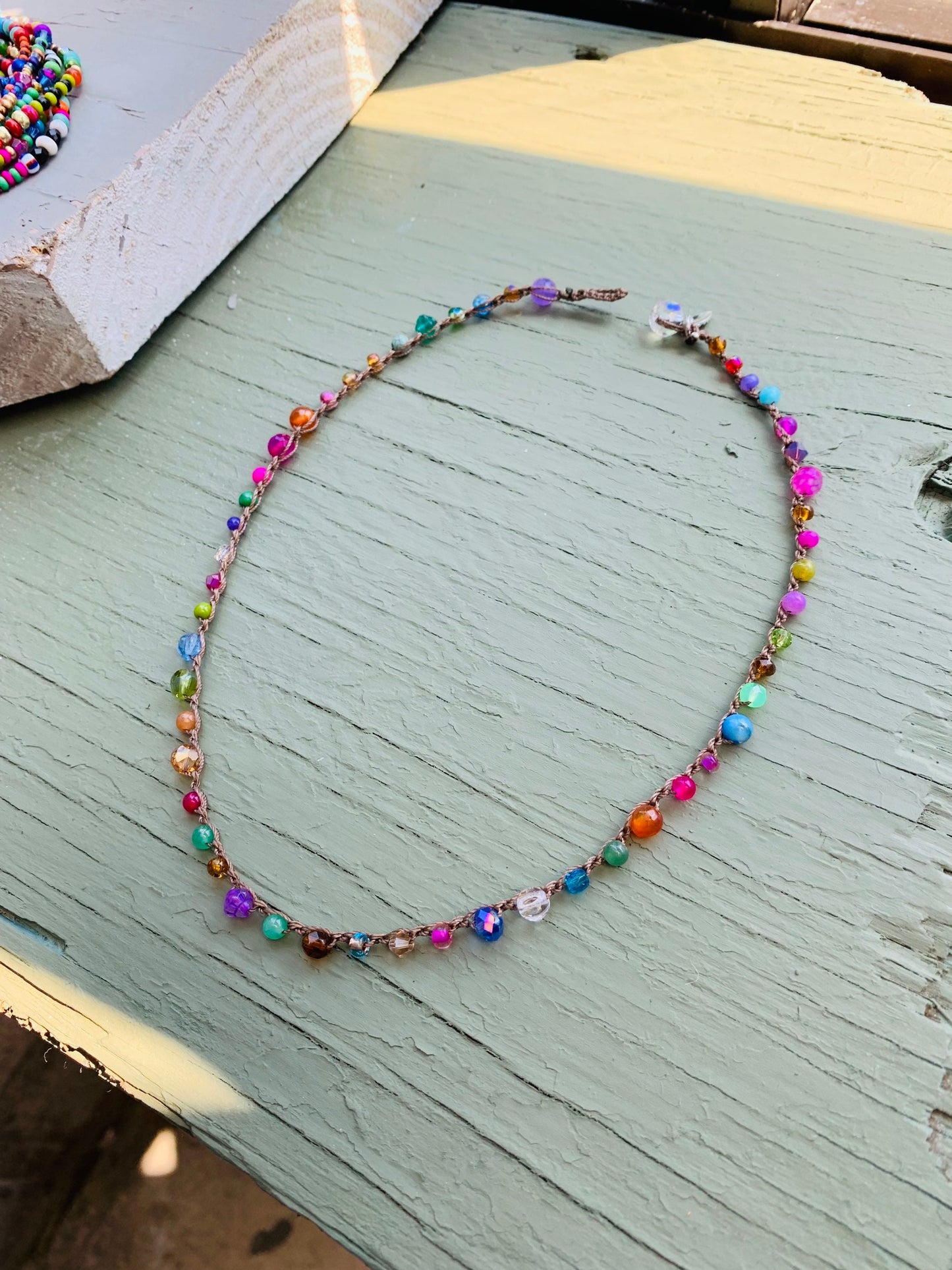 Pebble beach natural earthy necklace, with leaf charm