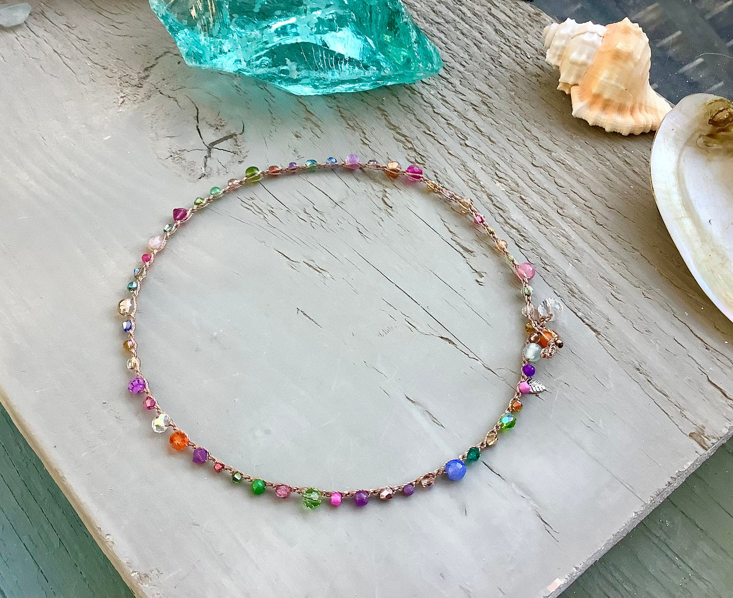 Pebble beach natural earthy necklace, with leaf charm